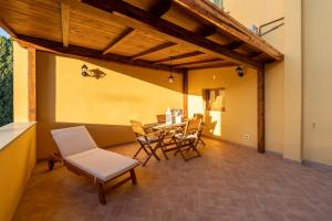 Posezení v ubytování Lajatico Rentals - Terrazza sul Tramonto del Silenzio