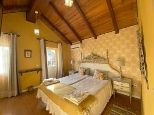 Uma cama ou camas num quarto em Villa Silene