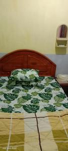 Ένα ή περισσότερα κρεβάτια σε δωμάτιο στο Javalindra Homestay Tour and Travel