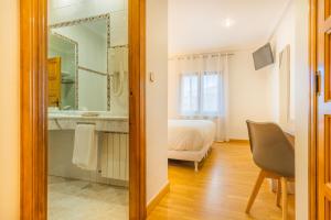 Łazienka w obiekcie Hostal Gran Duque