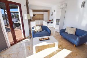 Posedenie v ubytovaní Penthouse 17A, Frigiliana 2 bedroom, Pool, Large Terrace and Amazing views in the center of Frigiliana HansOnHoliday Rentals