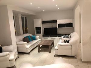 Ein Sitzbereich in der Unterkunft Ferienwohnung Amperblick Fürstenfeldbruck