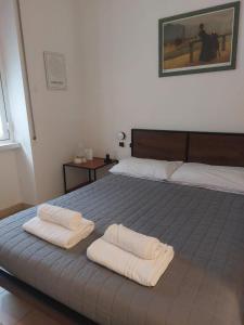 Postel nebo postele na pokoji v ubytování CiaoMi - Hostel & Long Stay - Milano Niguarda & Bicocca