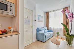 A kitchen or kitchenette at Suite Deluxe Face Mer Apart Malaga