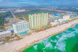an aerial view of a beach with buildings and the ocean at Totally Beach'n at 1605 Aqua in Panama City Beach
