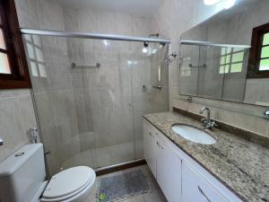 Koupelna v ubytování Casa com vista deslumbrante próximo a feirinha