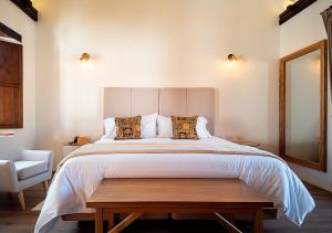 Katil atau katil-katil dalam bilik di Hotel Casa Alcestre