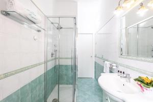 Koupelna v ubytování Maison Reginè + 35 fotografií