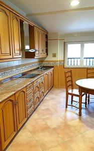 Kuchyňa alebo kuchynka v ubytovaní Apartamento con vistas al mar, Costa da Morte