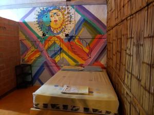 Ένα ή περισσότερα κρεβάτια σε δωμάτιο στο Casa surf arrels +13 φωτογραφίες