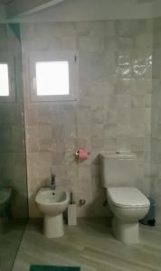 Kúpeľňa v ubytovaní spazioso e incantevole, funzionale, Wi-Fi, AC, patio, piscina condivisa