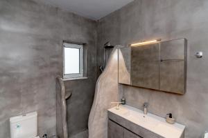 Kylpyhuone majoituspaikassa Bona's Guest House