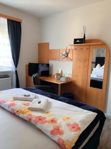 Łóżko lub łóżka w pokoju w obiekcie Frühstückspension Elena Nicoleta Caltun