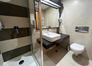 Koupelna v ubytování Hotel Ave Lux