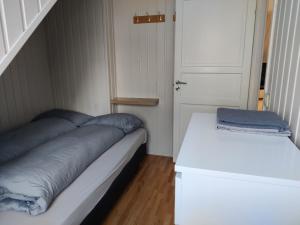 Postel nebo postele na pokoji v ubytování FeelHome 2-bedrooms apartment Vestregata Nord