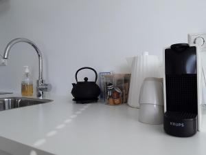 Kuchyň nebo kuchyňský kout v ubytování Maan B&B + Galerie