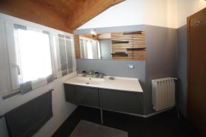 Koupelna v ubytování Dosse House + 15 fotografií