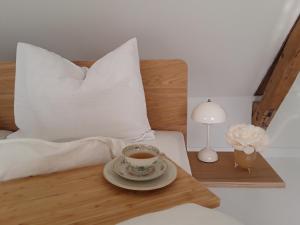 Postel nebo postele na pokoji v ubytování Maan B&B + Galerie