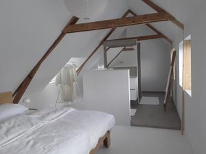 Postel nebo postele na pokoji v ubytování Maan B&B + Galerie