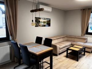 Posedenie v ubytovaní Apartamenty Czarna Perła