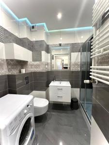 Kúpeľňa v ubytovaní Wola Apartments
