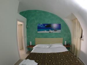Кровать или кровати в номере 3Sirene