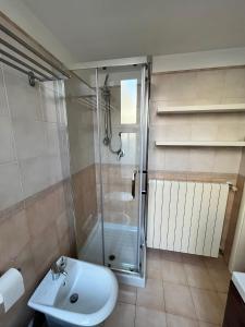 a bathroom with a shower and a sink at La terrazza di nonno Ciccio in Monopoli +15 photos