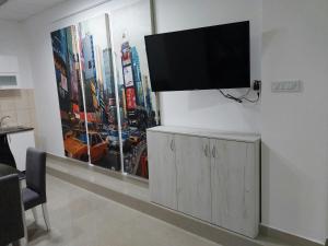 En tv och/eller ett underhållningssystem på Apartman Aleksić u samom centru grada