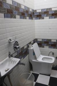 a bathroom with a toilet and a sink at The Mehran way Homestay in Jodhpur