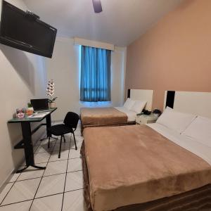 Ліжко або ліжка в номері Hotel Cali Blvd.