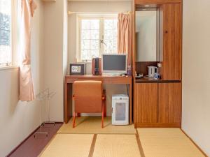 TV i/ili multimedijalni sistem u objektu Hakuba Sun Valley Hotel Annex - Vacation STAY 90351v