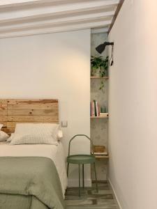 Кровать или кровати в номере Casa Santello