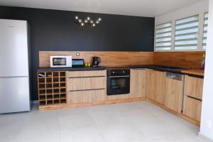 Nhà bếp/bếp nhỏ tại EBENE