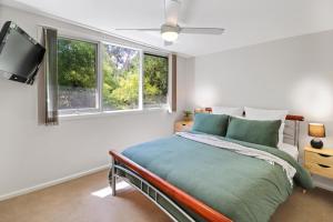 מיטה או מיטות בחדר ב-Dawn Retreat