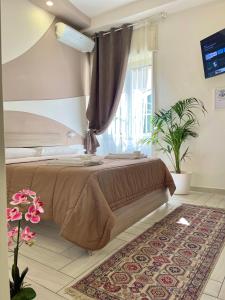 Een bed of bedden in een kamer bij Terrazza Garibaldi