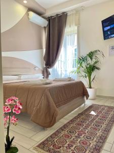 A bed or beds in a room at Terrazza Garibaldi