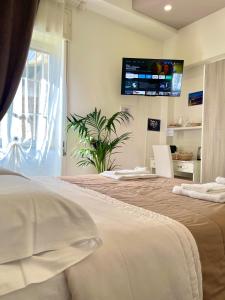 A bed or beds in a room at Terrazza Garibaldi