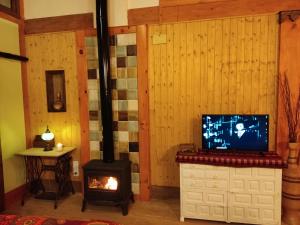 TV a/nebo společenská místnost v ubytování Apartamento El Grifo