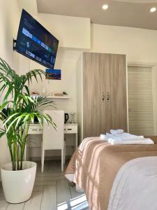 A bed or beds in a room at Terrazza Garibaldi