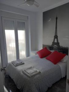 Posteľ alebo postele v izbe v ubytovaní Apartamento cerca del puerto y del paseo