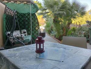 a red lantern sitting on top of a table at La Mimosa in Porto Garibaldi +17 photos