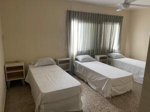 Una cama o camas en una habitación de ApartSanMartin561