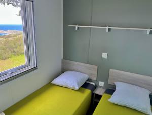 Postel nebo postele na pokoji v ubytování Chez Mina