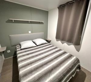 Postel nebo postele na pokoji v ubytování Chez Mina