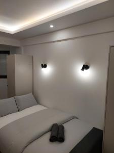 Postel nebo postele na pokoji v ubytování Lisbon South Bay Rooms