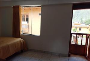 Postel nebo postele na pokoji v ubytování Casa D´Maria