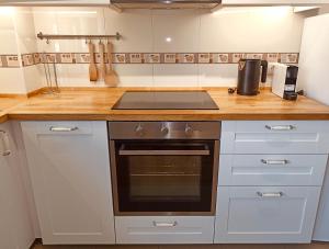 A kitchen or kitchenette at Apartamento Little Xoan