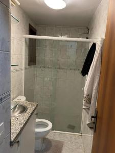 Ванна кімната в Apartamento com elevador central