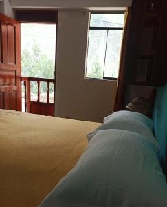 Postel nebo postele na pokoji v ubytování Casa D´Maria