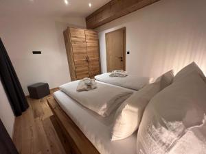 Postel nebo postele na pokoji v ubytování Appartements Plus